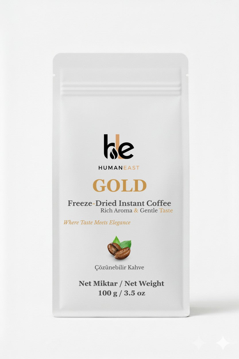 Humaneast Gold Freeze-Dried Instant Coffee front pouch – minimalist matte white design with gold accents.